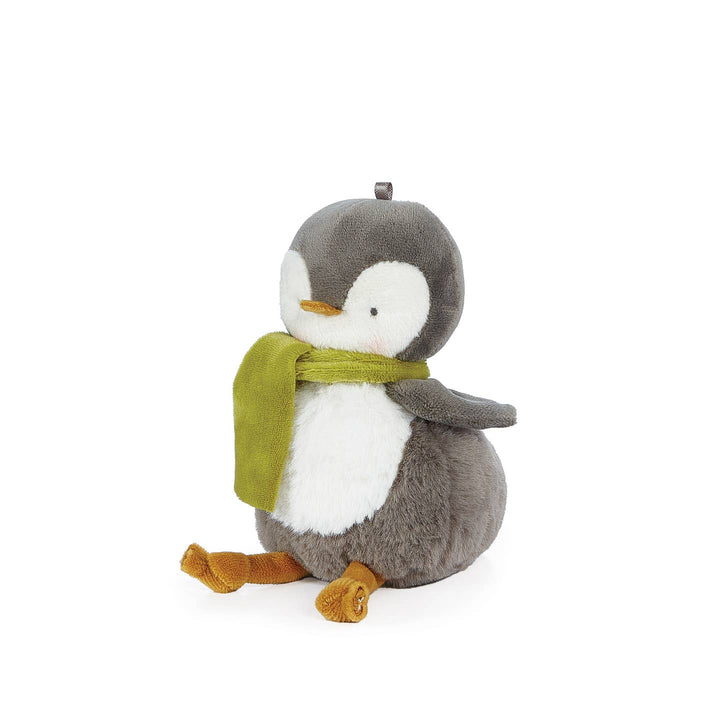 Plush penguin toy with a green scarf on a white background
