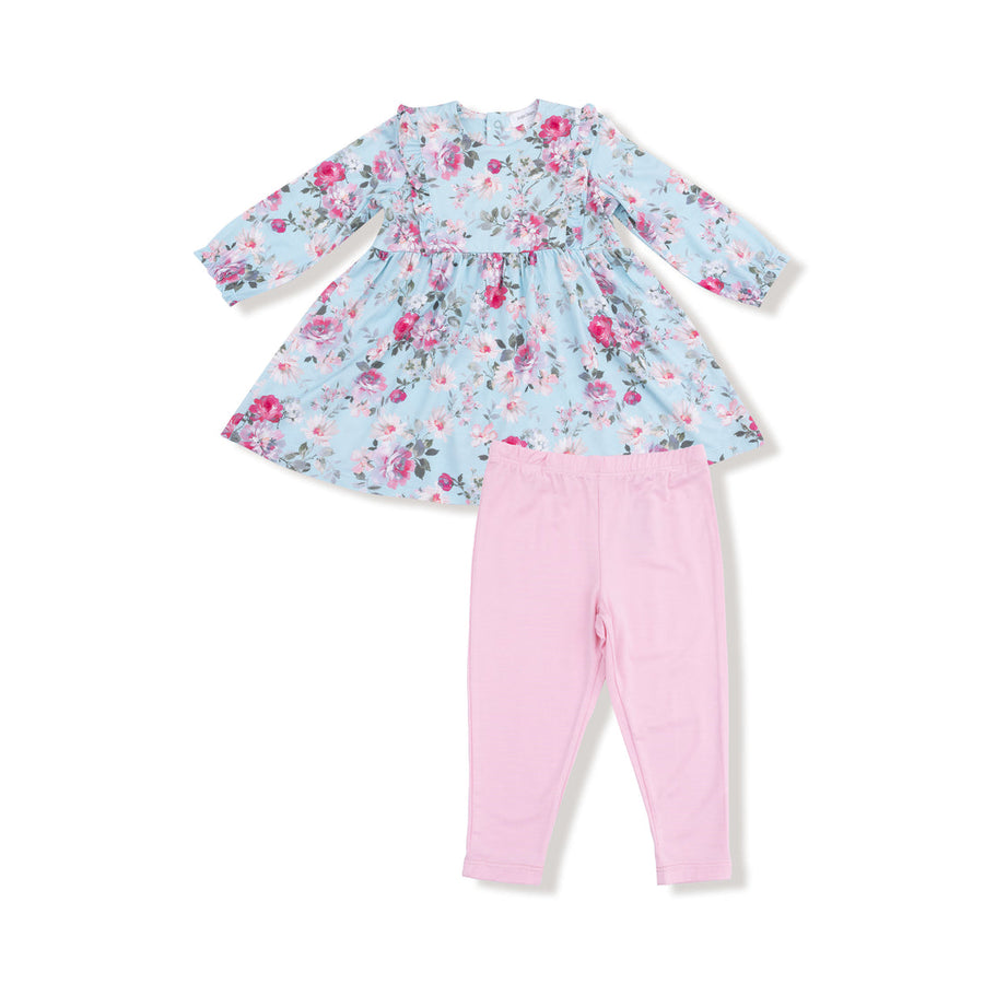 Floral dress and pink pants set on a white background