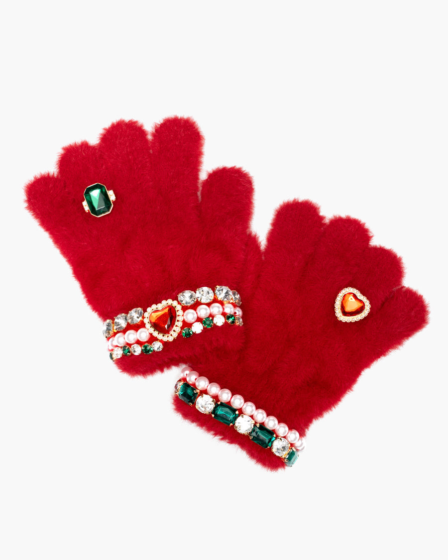 Red gloves with decorative elements on a white background