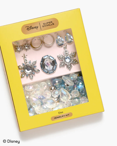 light blue and clear beads in the yellow box. Elsa theme to the jewelery making kit. 