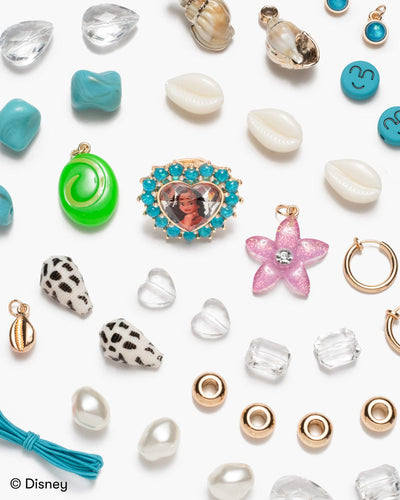 close up of the beads and charms in thier kit - all Moana and ocean theme