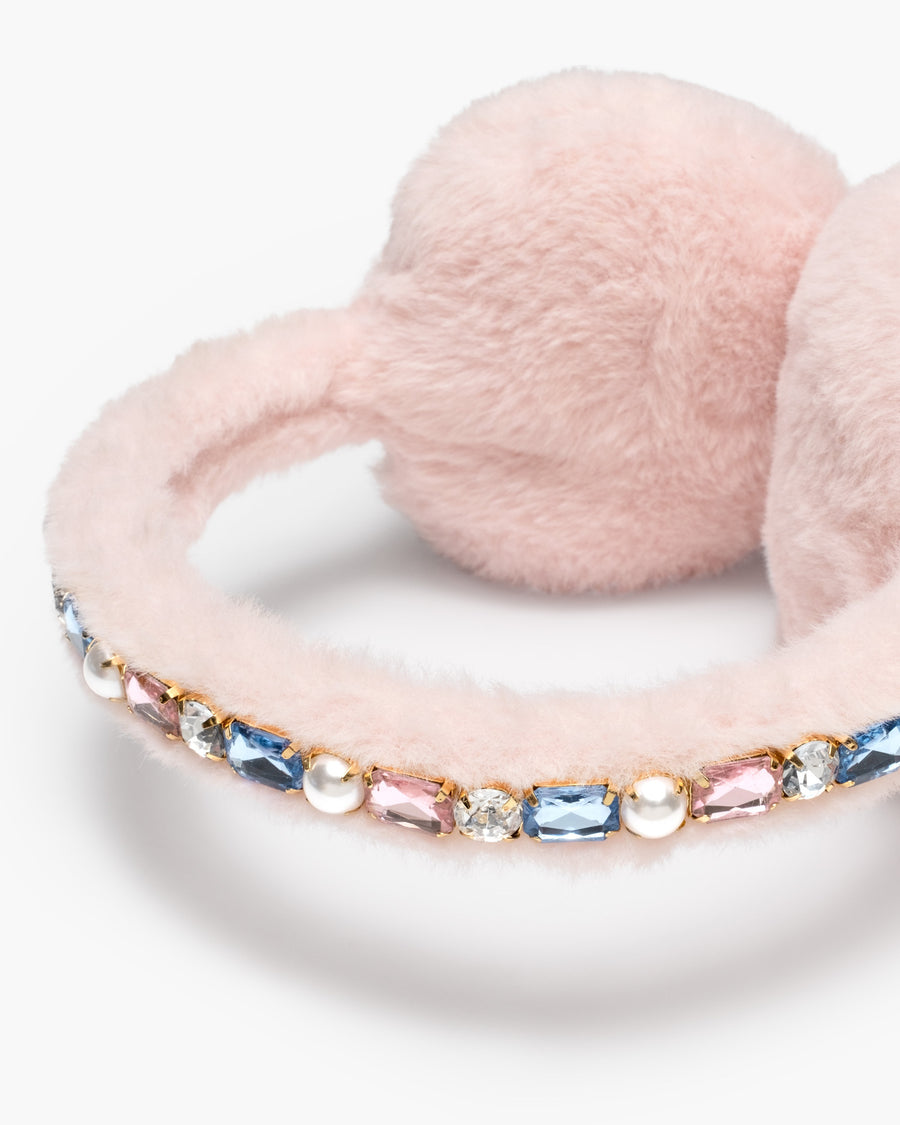 Multicolored beaded bracelet on a pink fluffy background