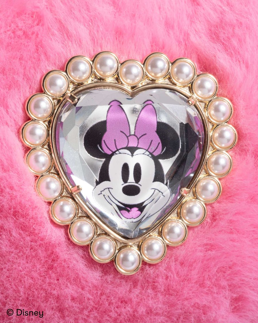 Heart-shaped brooch with Minnie Mouse design on a pink background