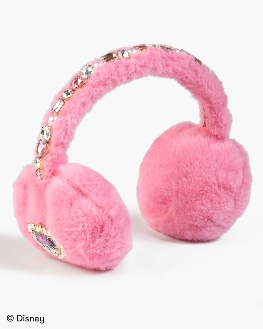 Pink furry earmuffs with rhinestone accents on a white background, featuring Disney branding.