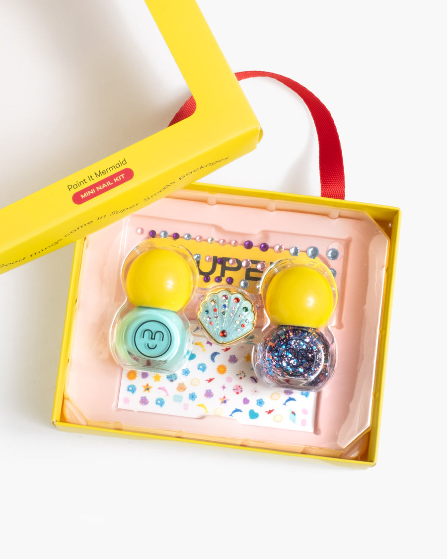 Colorful nail polish set in a yellow box on a white background