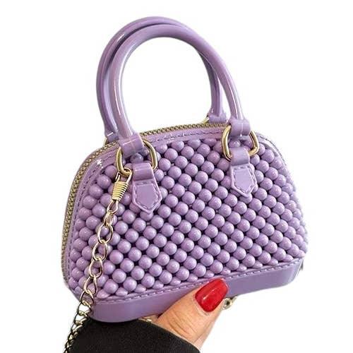 mini bubble jelly bowler handbag in the color purple. 