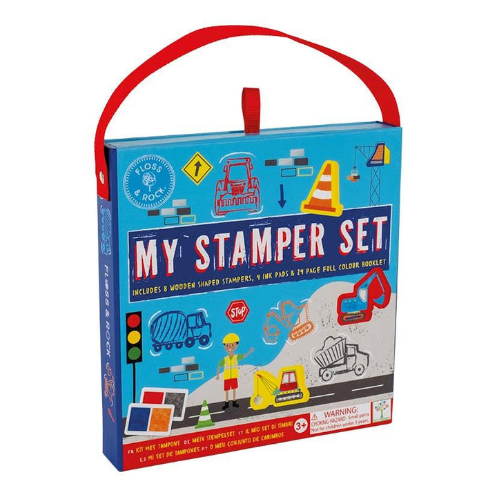 stamper set inside packaging case with stamps and ink pads, this set theme is construction. 