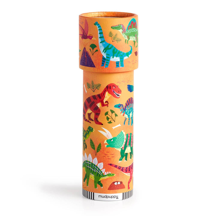 Colorful cylindrical toy with dinosaur illustrations on an orange background