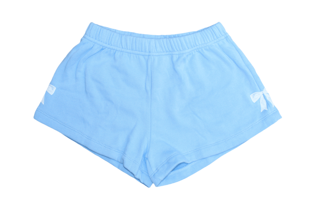 baby blue shorts with white bows on each side. elastic waist