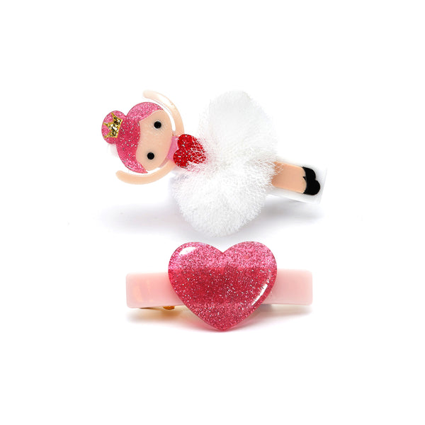 set of 2 alligator clips, one is pink with a pink glitter heart attached and the other is a ballerina wearing a white tutu with a red hear and pink glitetr hair. 