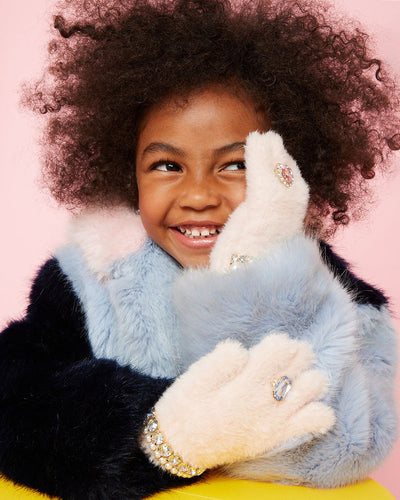 little girl modeling the pink gloves with rhinestones and pearls added for extra jazz