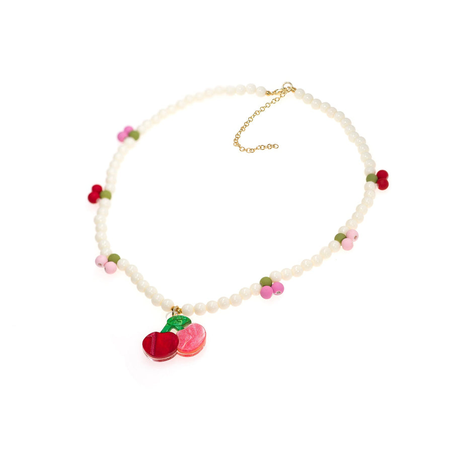 Necklace with colorful fruit charms on a white background
