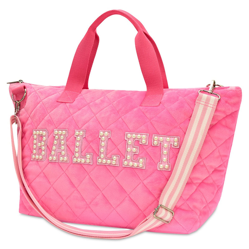 sideview of pink overnight tote with Ballet written on it with pearl applique patches written on the side of it. 