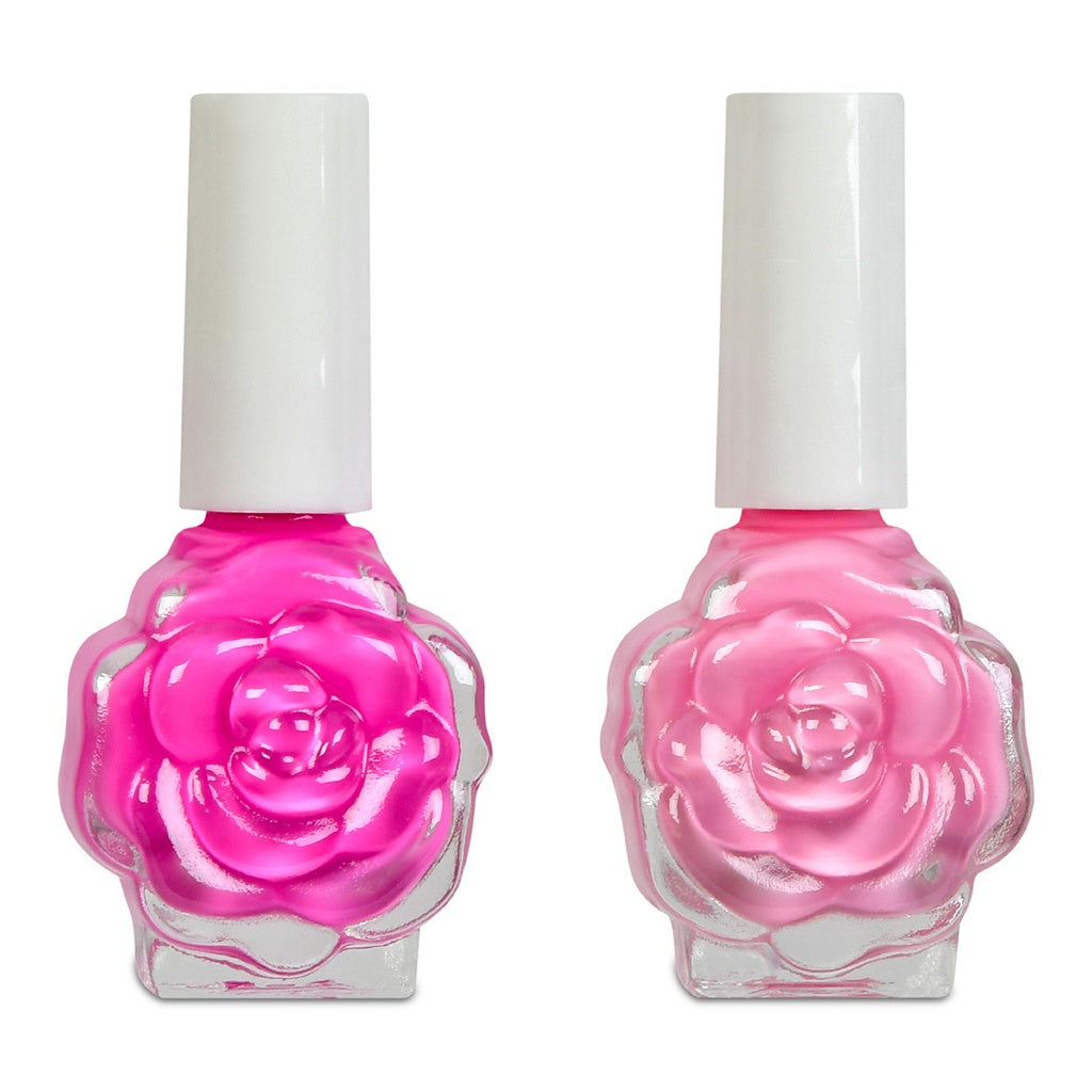 Two pink nail polish bottles with rose designs on a white background