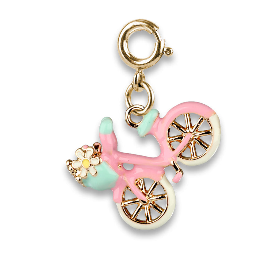 Pink bicycle charm with gold accents on a white background