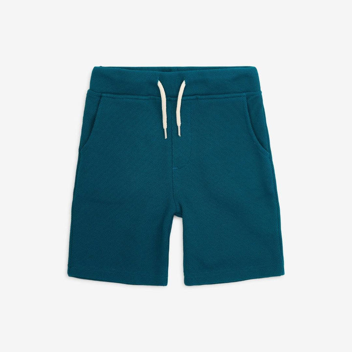 cotton everyday shorts with an elastic waist and drawstring in a teal color. 