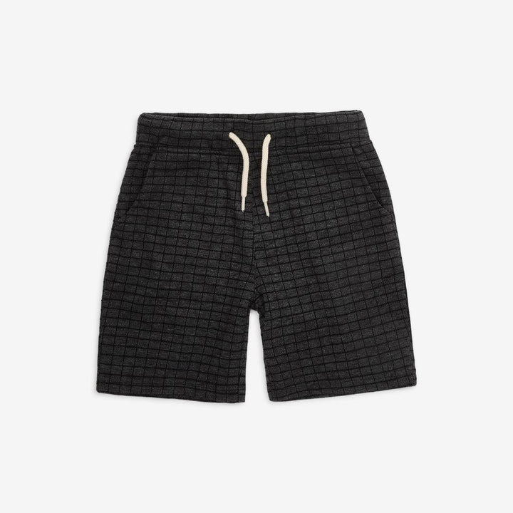 elastic wast black shorts geometric square print on the shorts. 