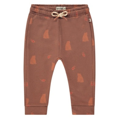 brown joggers with tan reddish bears all over. 