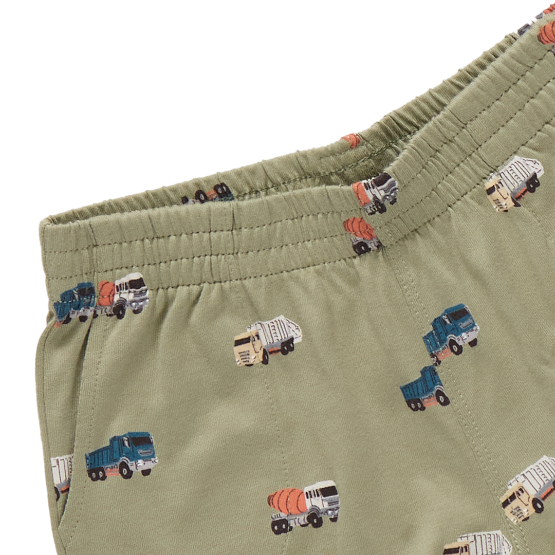 Green shorts with truck pattern on a white background