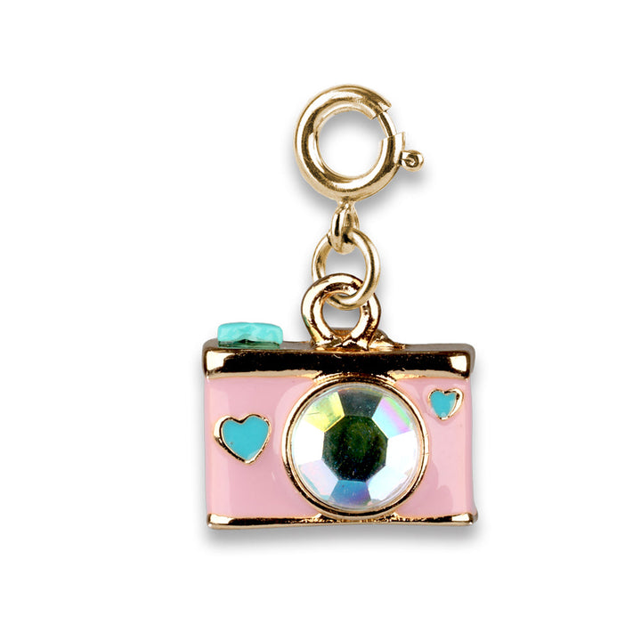 Pink camera charm with a gold border on a white background
