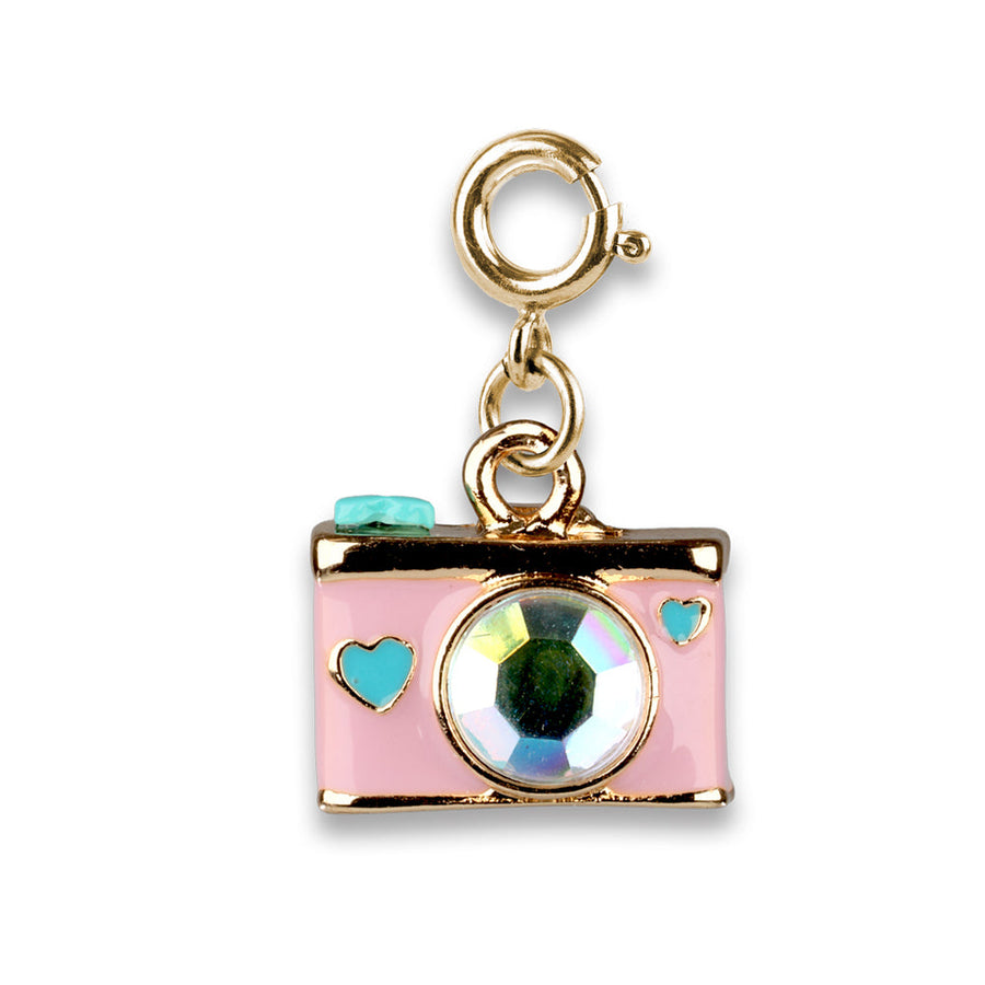 Pink camera charm with a gold border on a white background