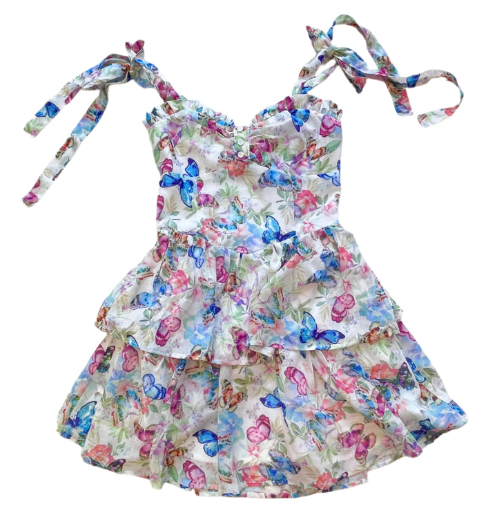 spaghetti strap dress with layered skirt and multi colored butterfly print all over the dress