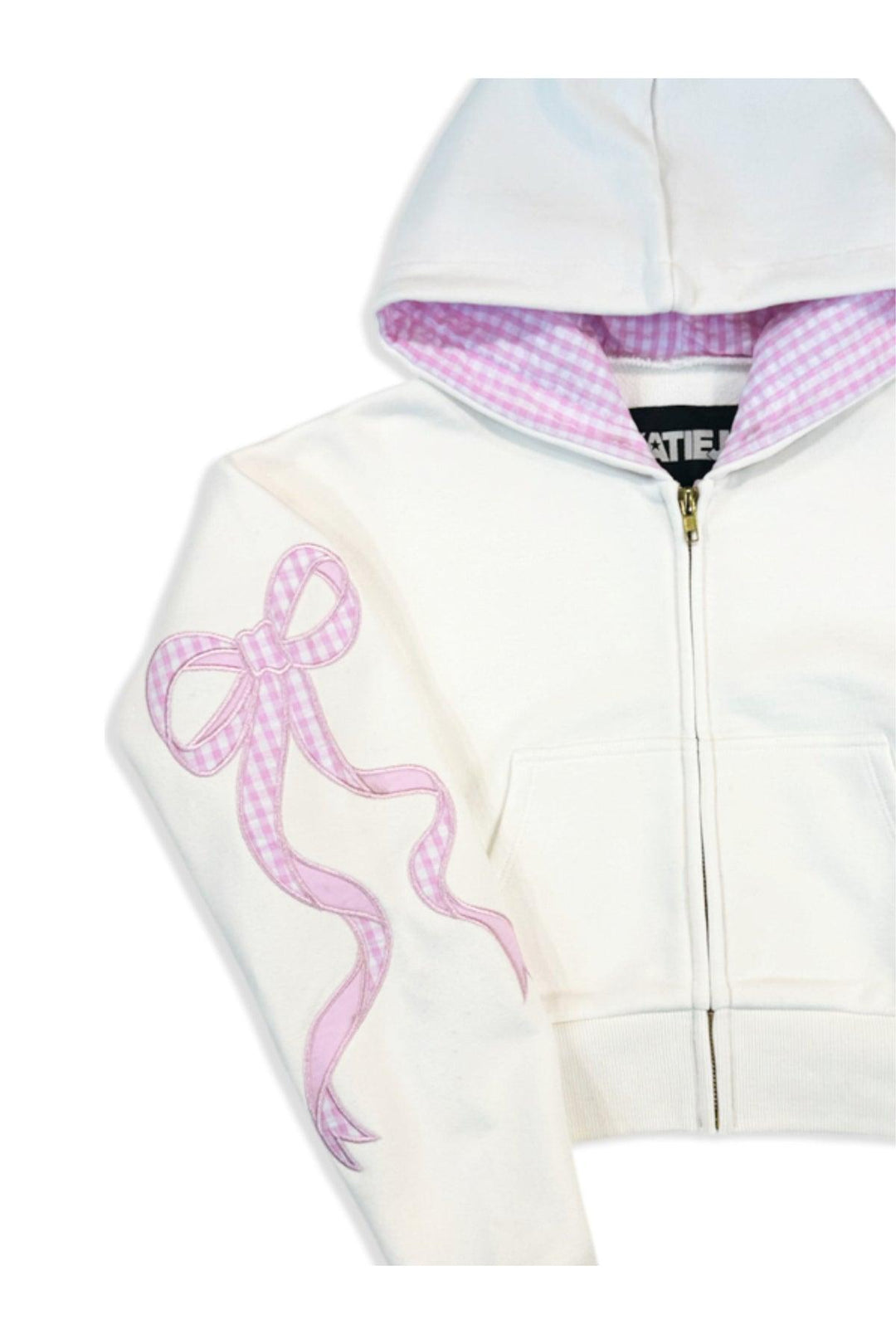 close up of the coquette bow detail on the sleeve. 