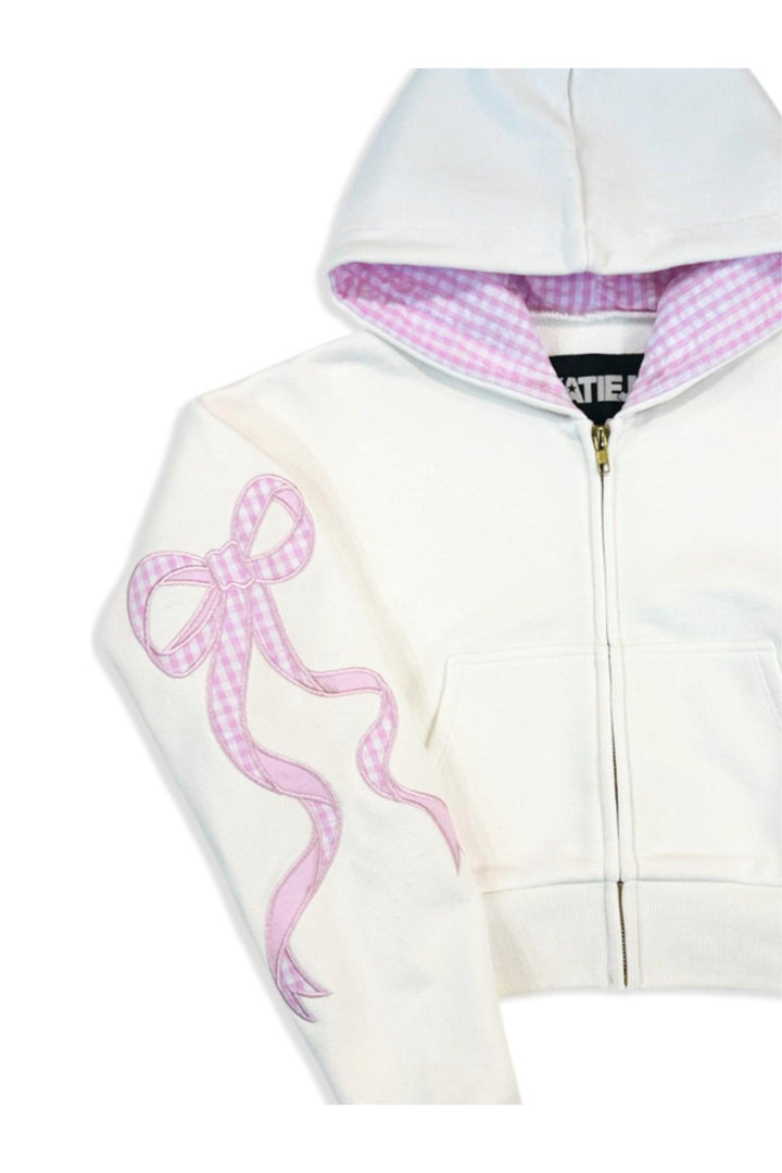 close up of the coquette bow detail on the sleeve. 