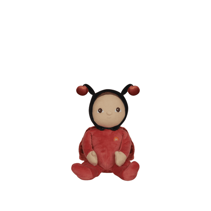 baby doll dressed as a red ladybug with wings and antannae. 