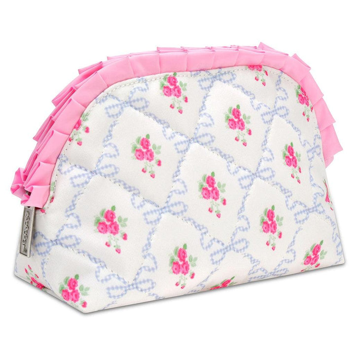 white floral cosmetic bag with pink flowers all over the front with pink ruffles at the top of the bag