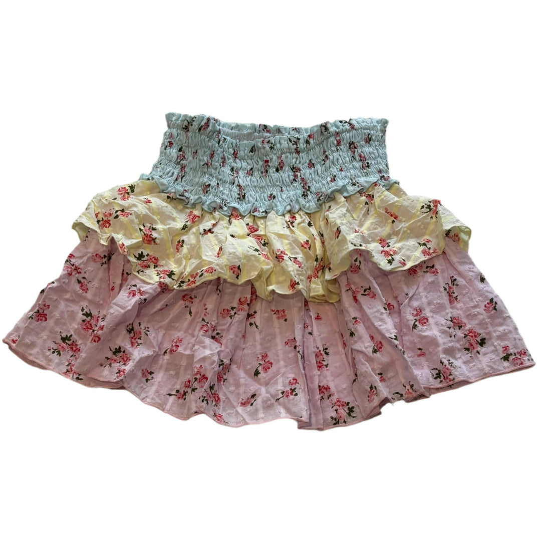 girls skirt with two ruffles pastel skirt with tiny pink roses all over: waist band is light blue, first ruffle is yellow and the second ruffle is pink. 