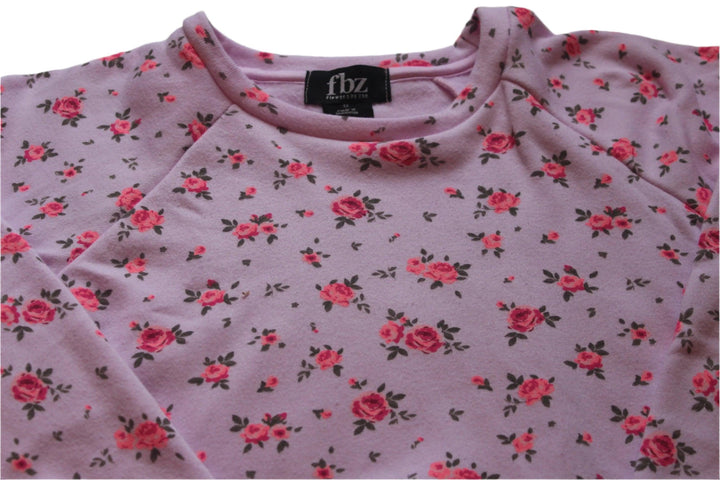 close up of the neckline of the pink sweatshirt with tiny pink roses. 