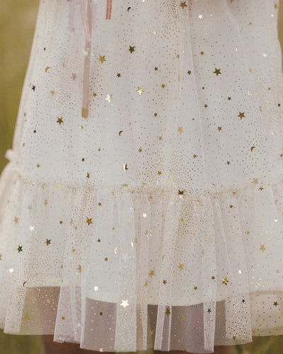 close up image of the tulle fabric with the gold stars 