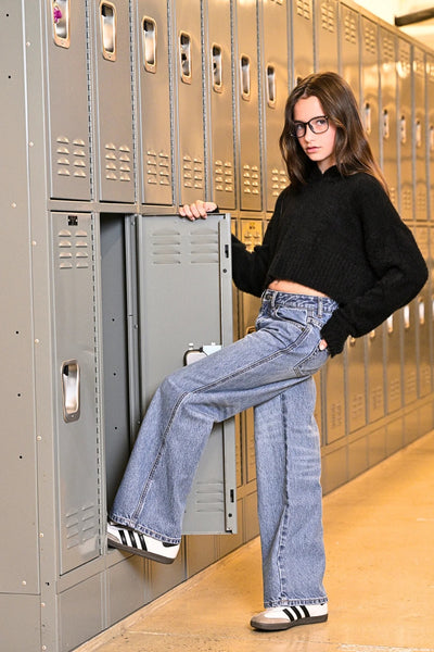 Emery Hooded Knit Sweater from Katie J NYC on a girl with wide leg denim jeans.