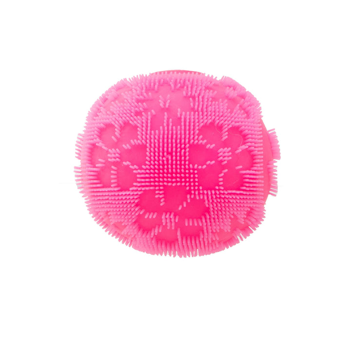 Pink silicone squish toy on a white background