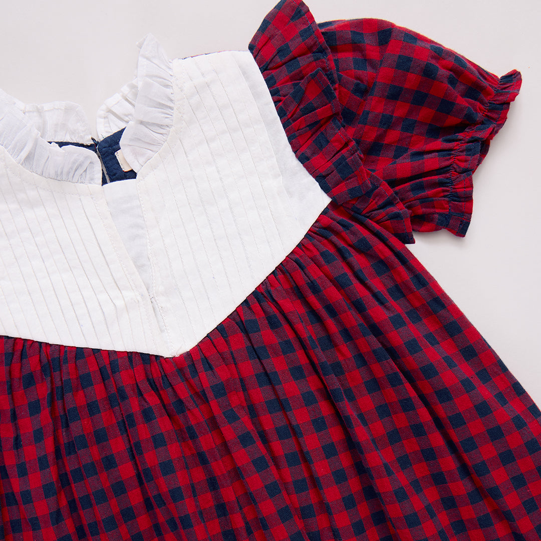 Red and blue plaid dress with white top 