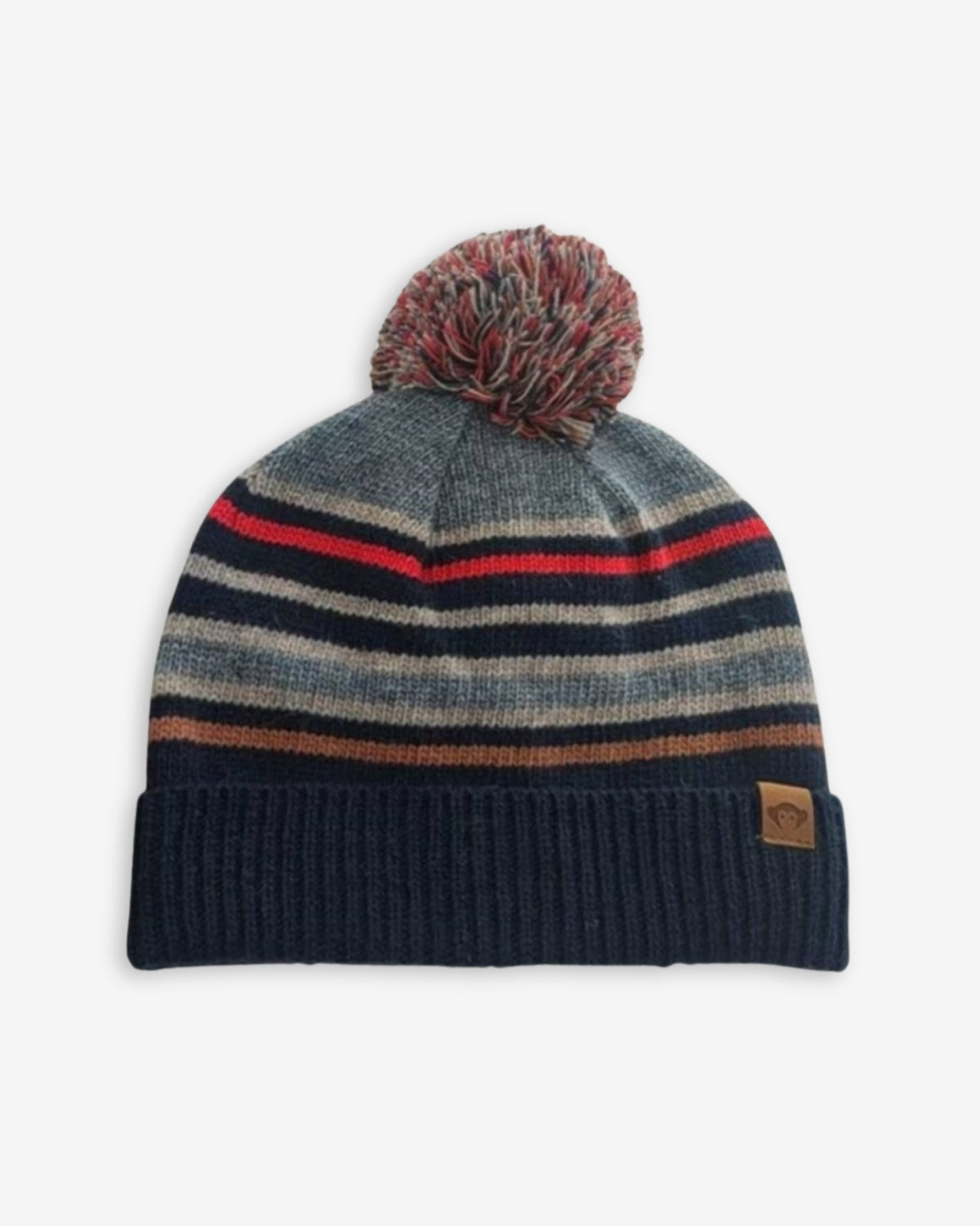 Knitted beanie with striped pattern and pom-pom on a white background