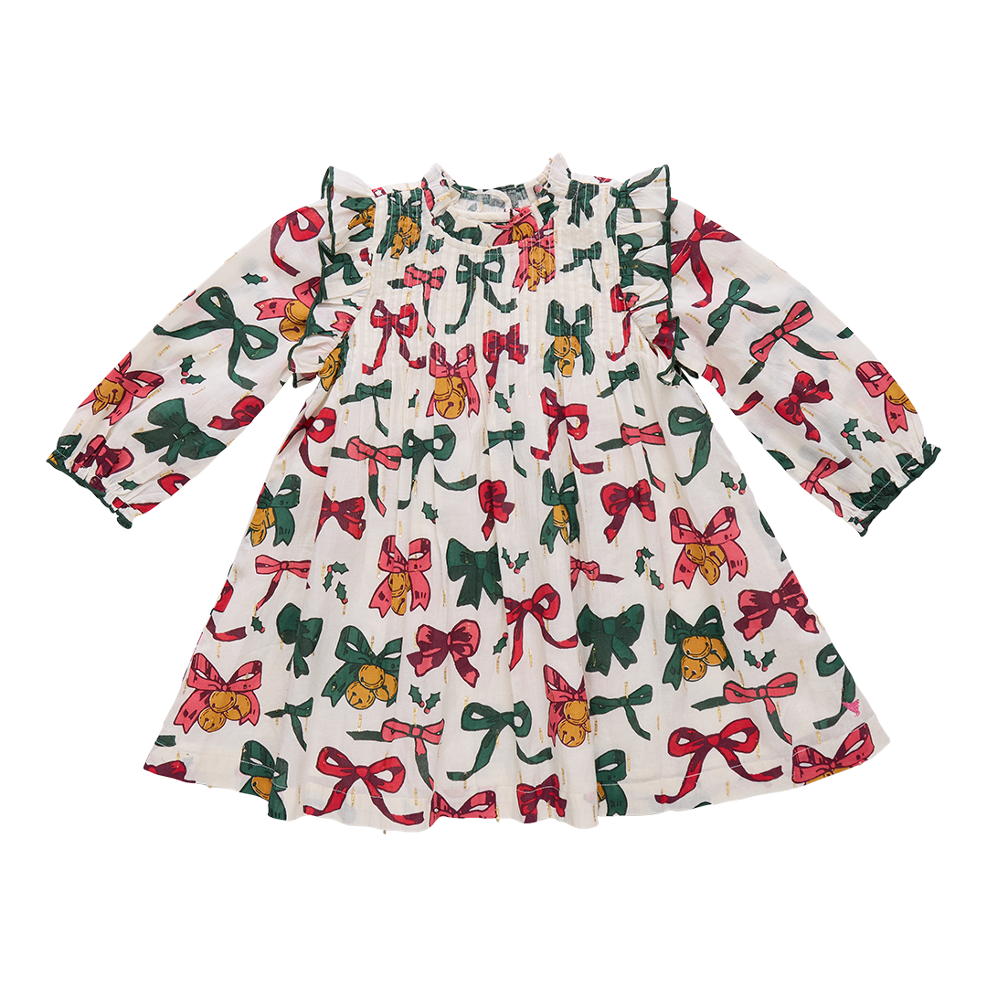 Dress with colorful bow pattern on a white background