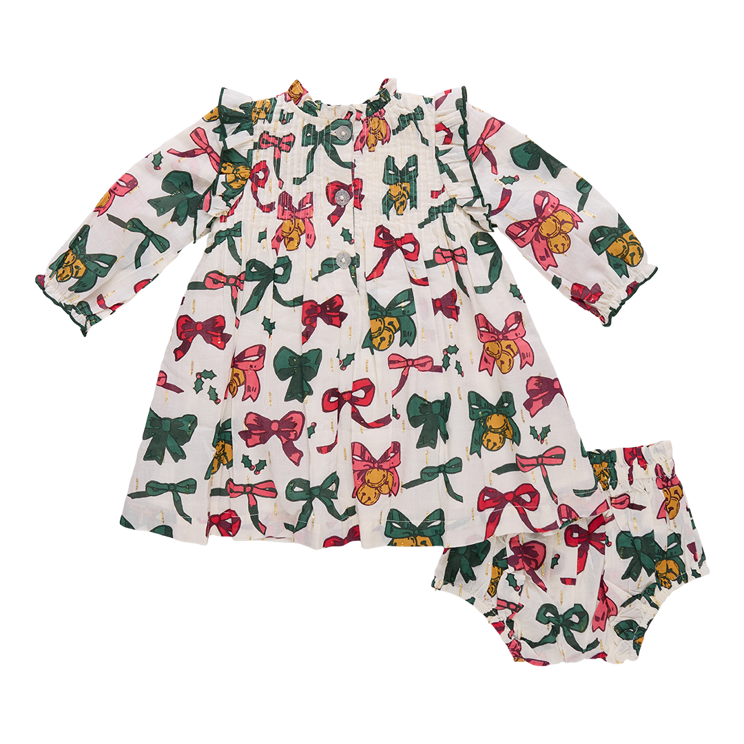 Baby outfit with long-sleeve dress and bloomers featuring colorful bow pattern on a white background