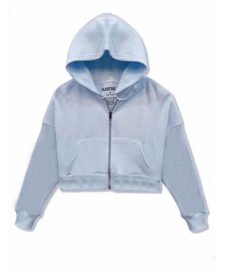 Light blue hoodie with a zipper on a white background