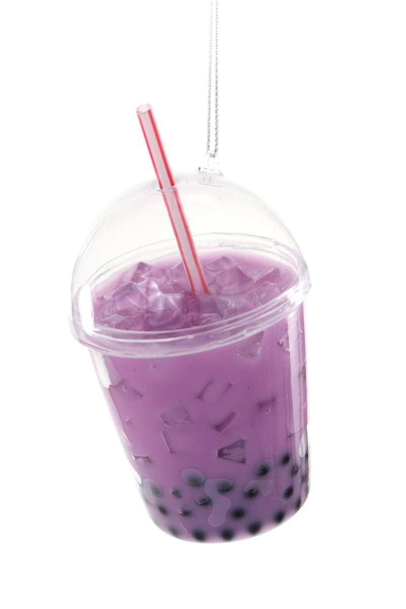 purple bubble tee in a travel container with straw. 