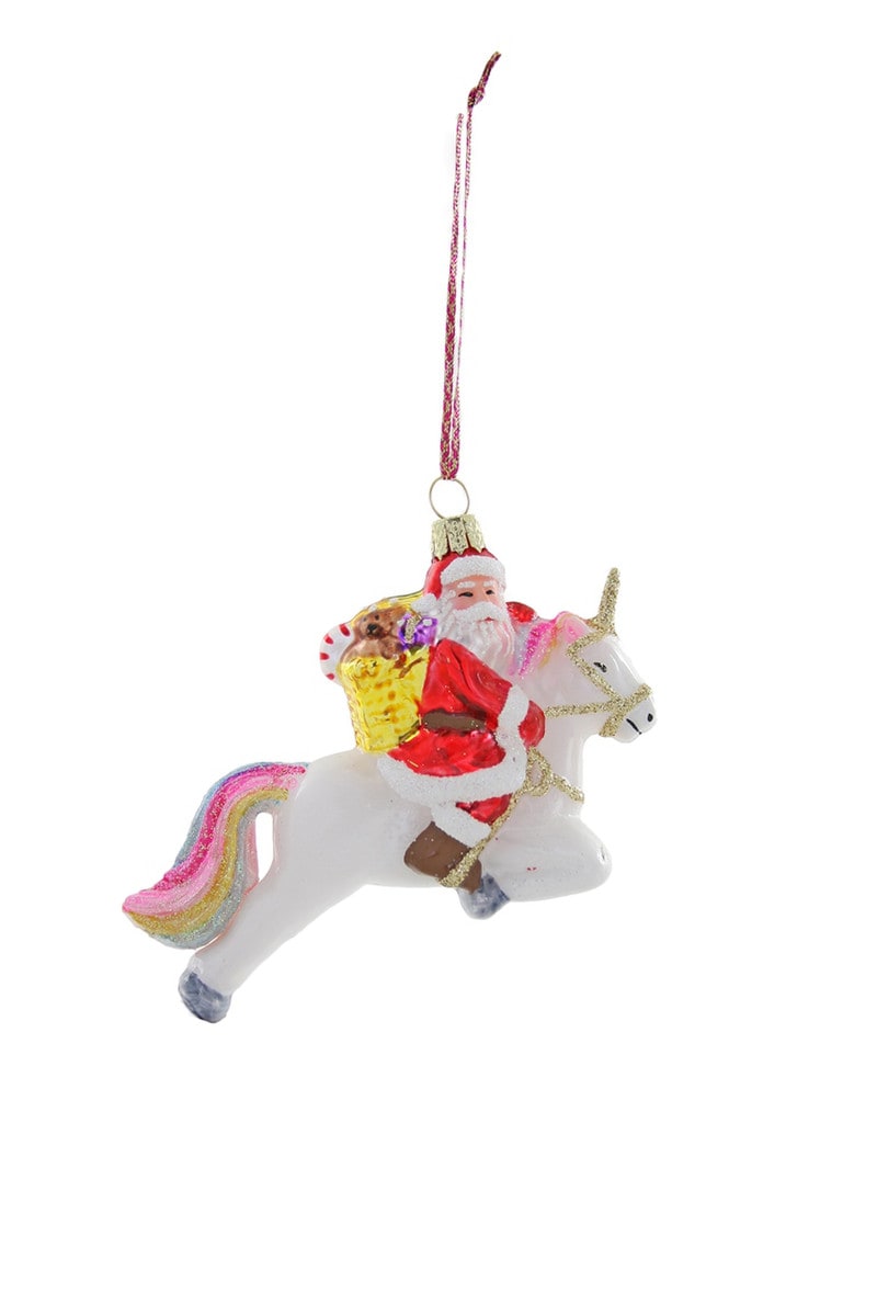 Santa Claus riding on a unicorn as  Holiday ornament 