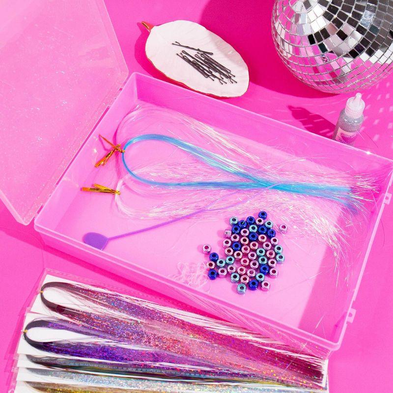 this shows a picture of the tools, tinsel and beads in the kit. 