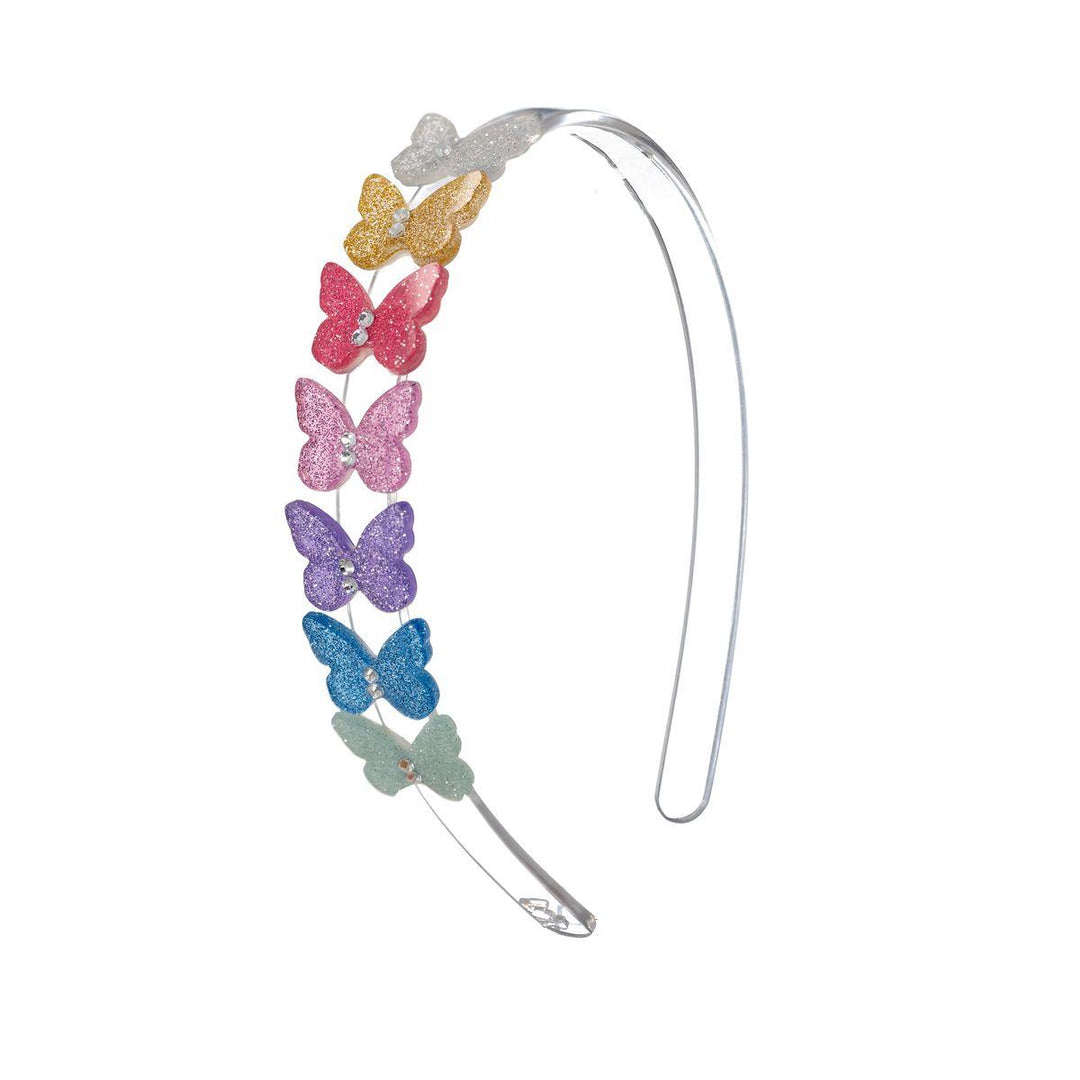 acrylic headband with multi butterflies lined up on one side, each a different pastel color with glitter added in. 