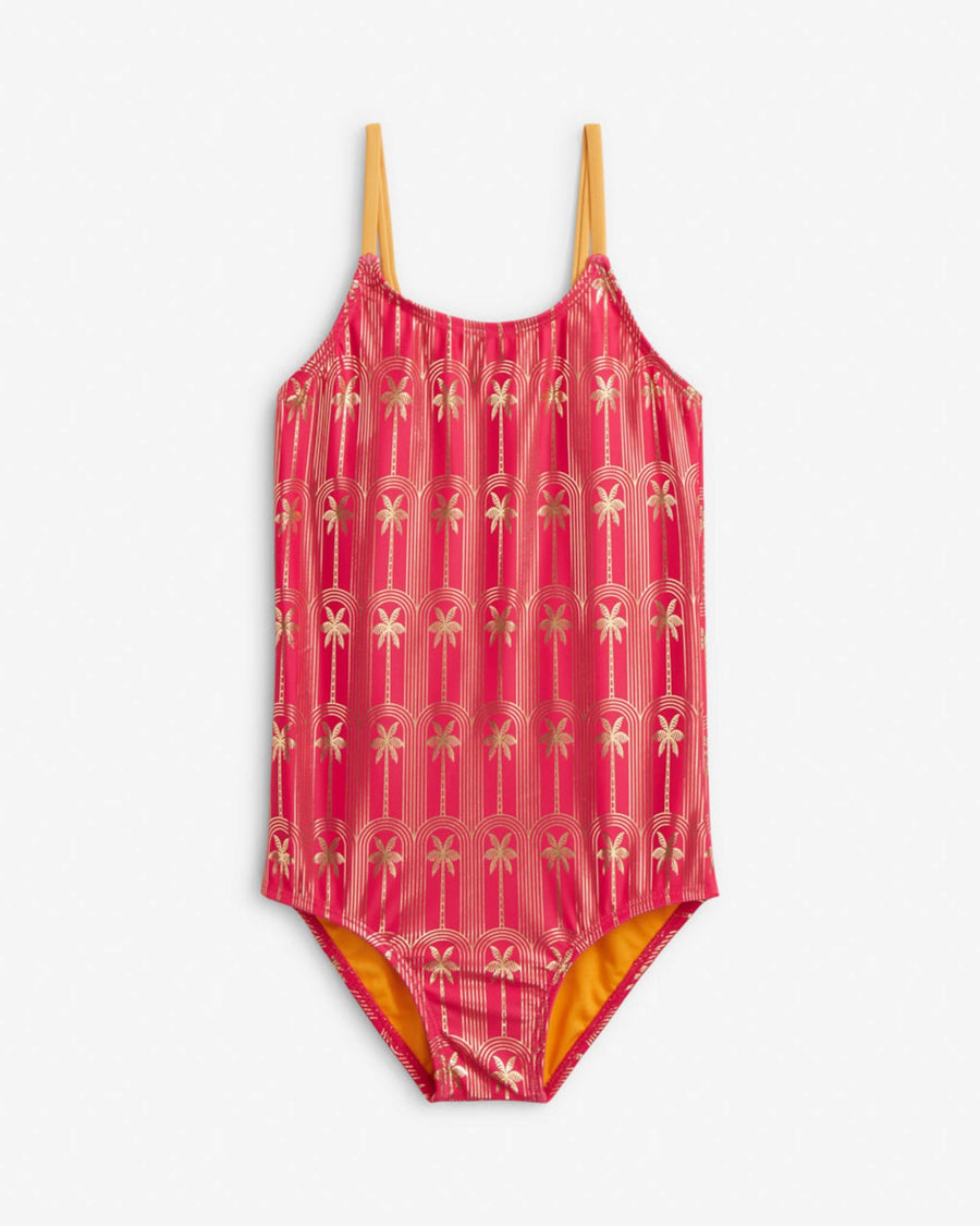 Pink swimsuit with gold patterns on a white background