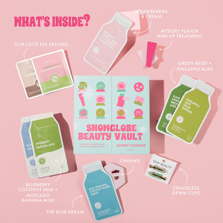 Snowclobe Beauty Vault contents on a pink background