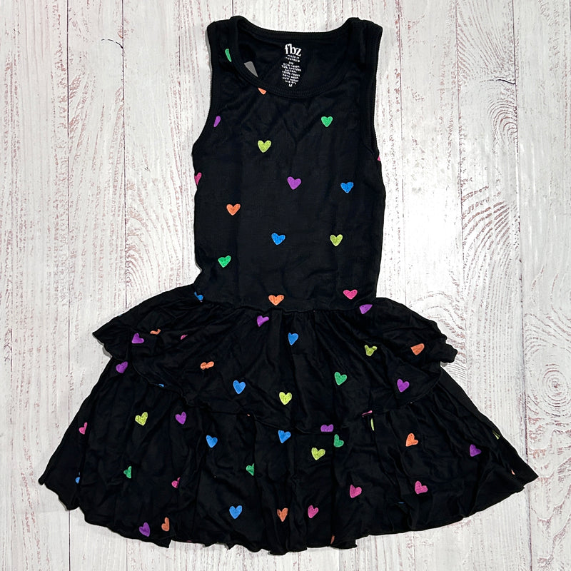 black dress with tank top and ruffled bottom. all over neon heart pattern