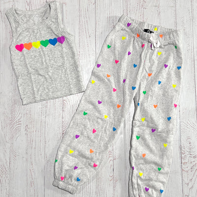 picture of the sweatpants and possibile matching tank. the tank is grey in color with neon colored hearts going across the chest. 