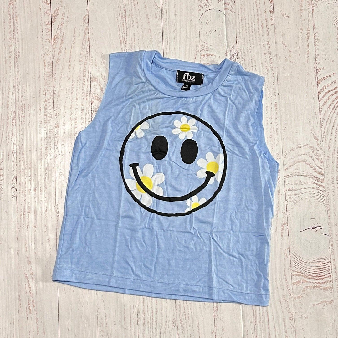 blue sleeveless tank with smiley face and daisies on the center of the smiley face. 