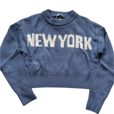 high neck knit sweater. vintage denim blue color with New York written across the chest. 